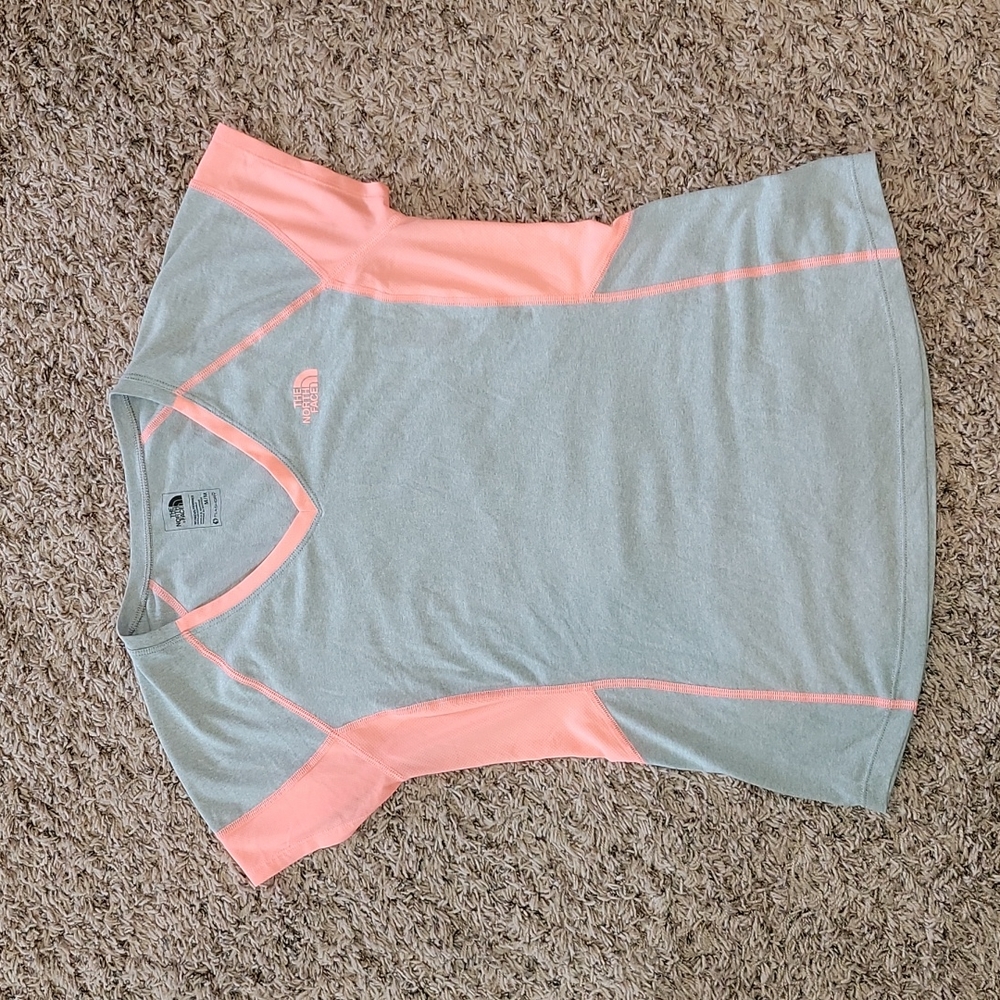 Women The North Face short-sleeved v-neck athletic shirt